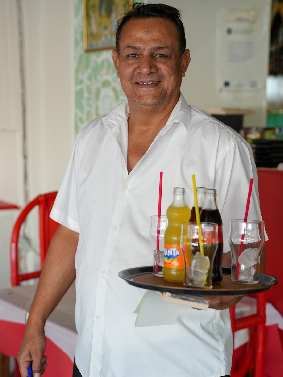 A member of the Asian Palace team on the terrace